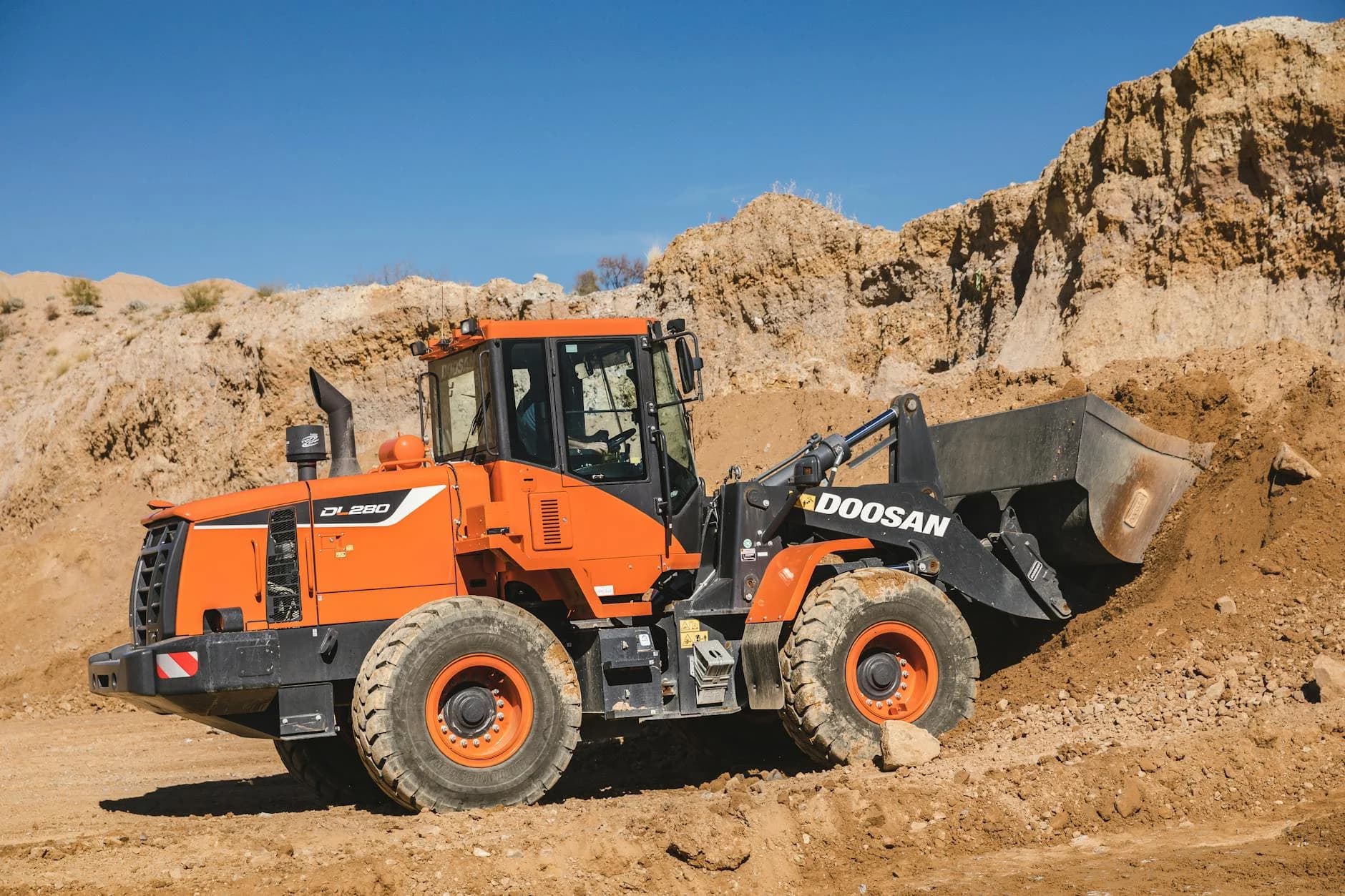 Orange Excavator Moving Earth At A Rural 4