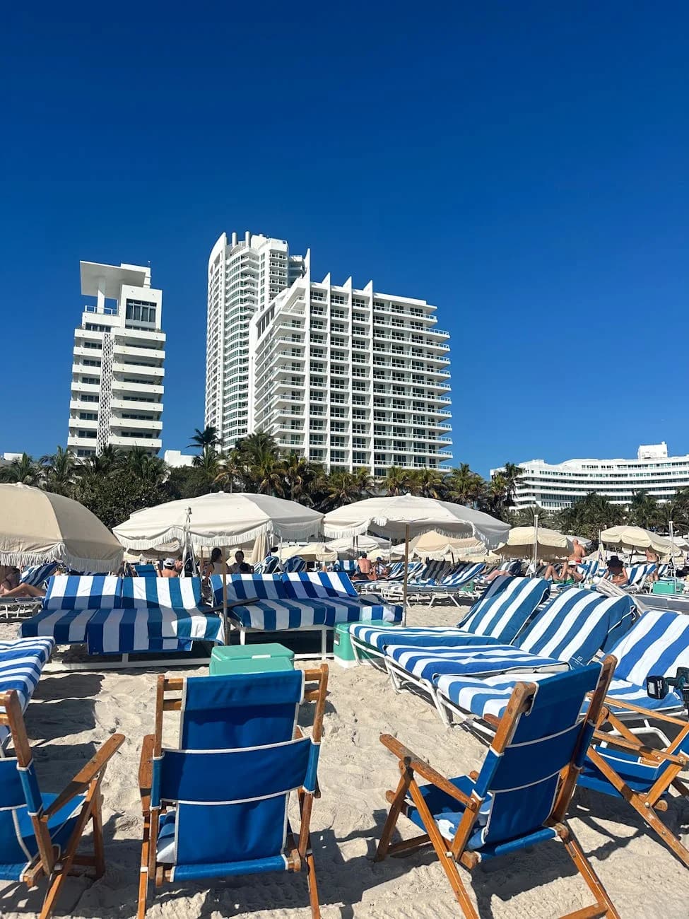 Bright Beach Scene With Sun Loungers And 1