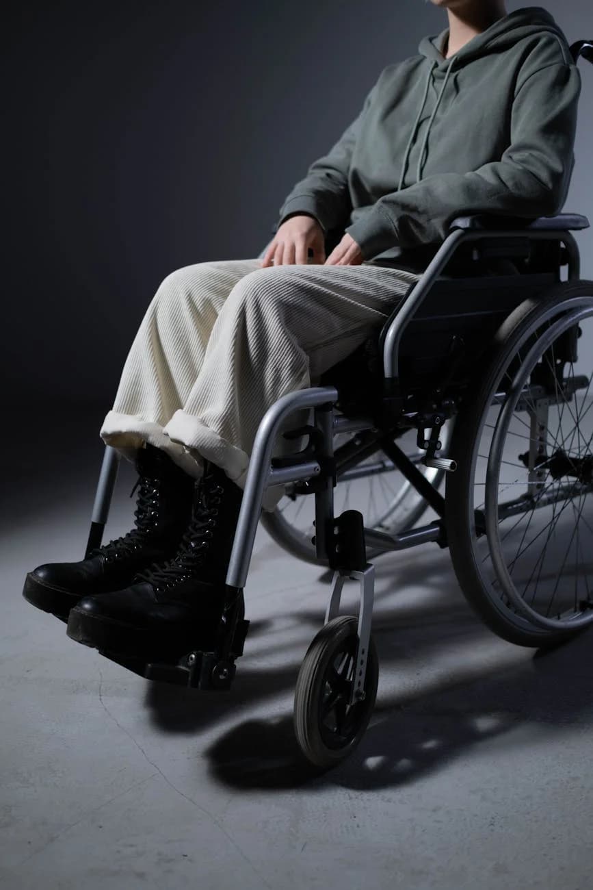 An Individual Seated In A Wheelchair Dre 3