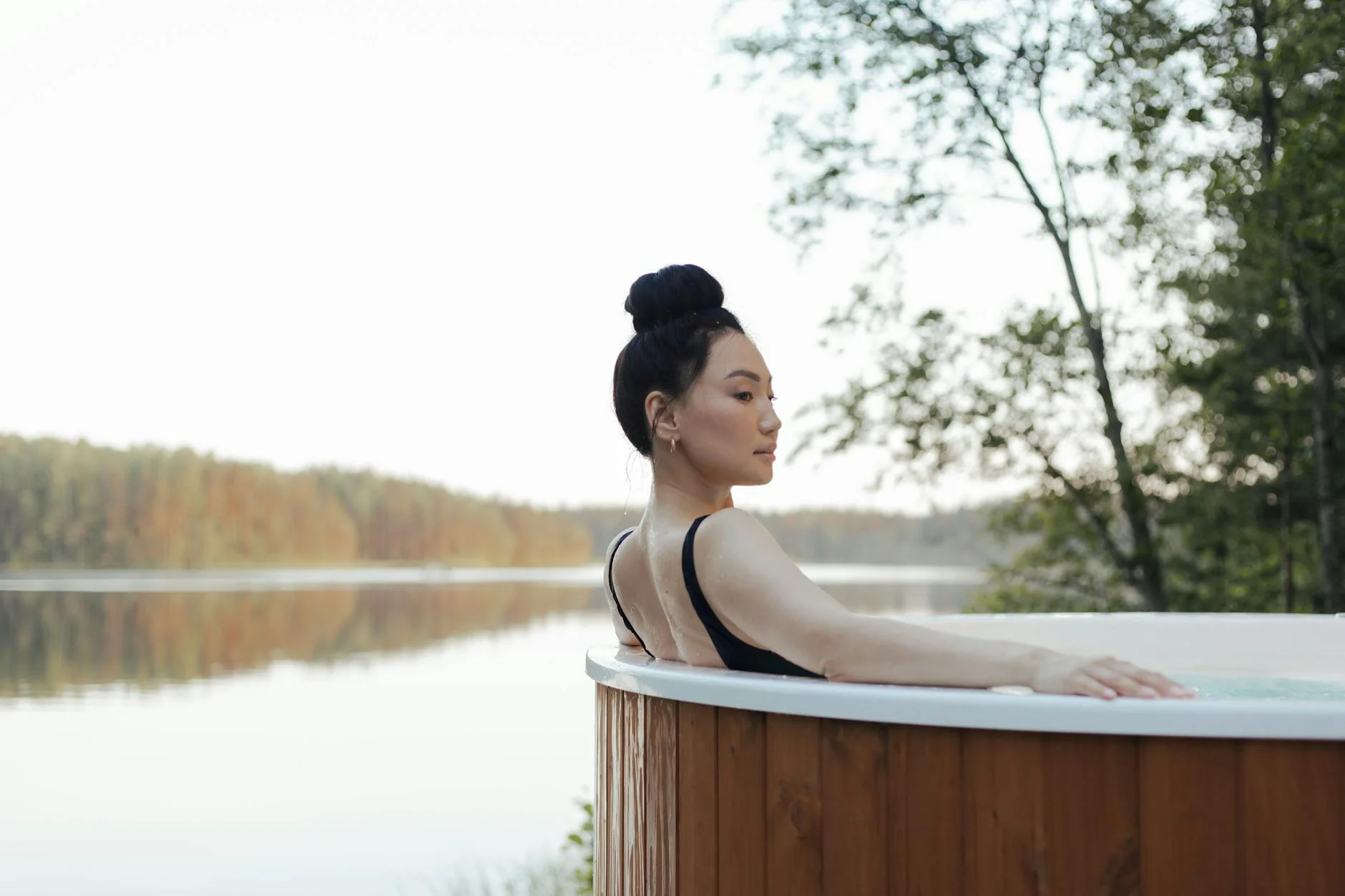 Asian Woman Enjoying A Serene Moment In 3