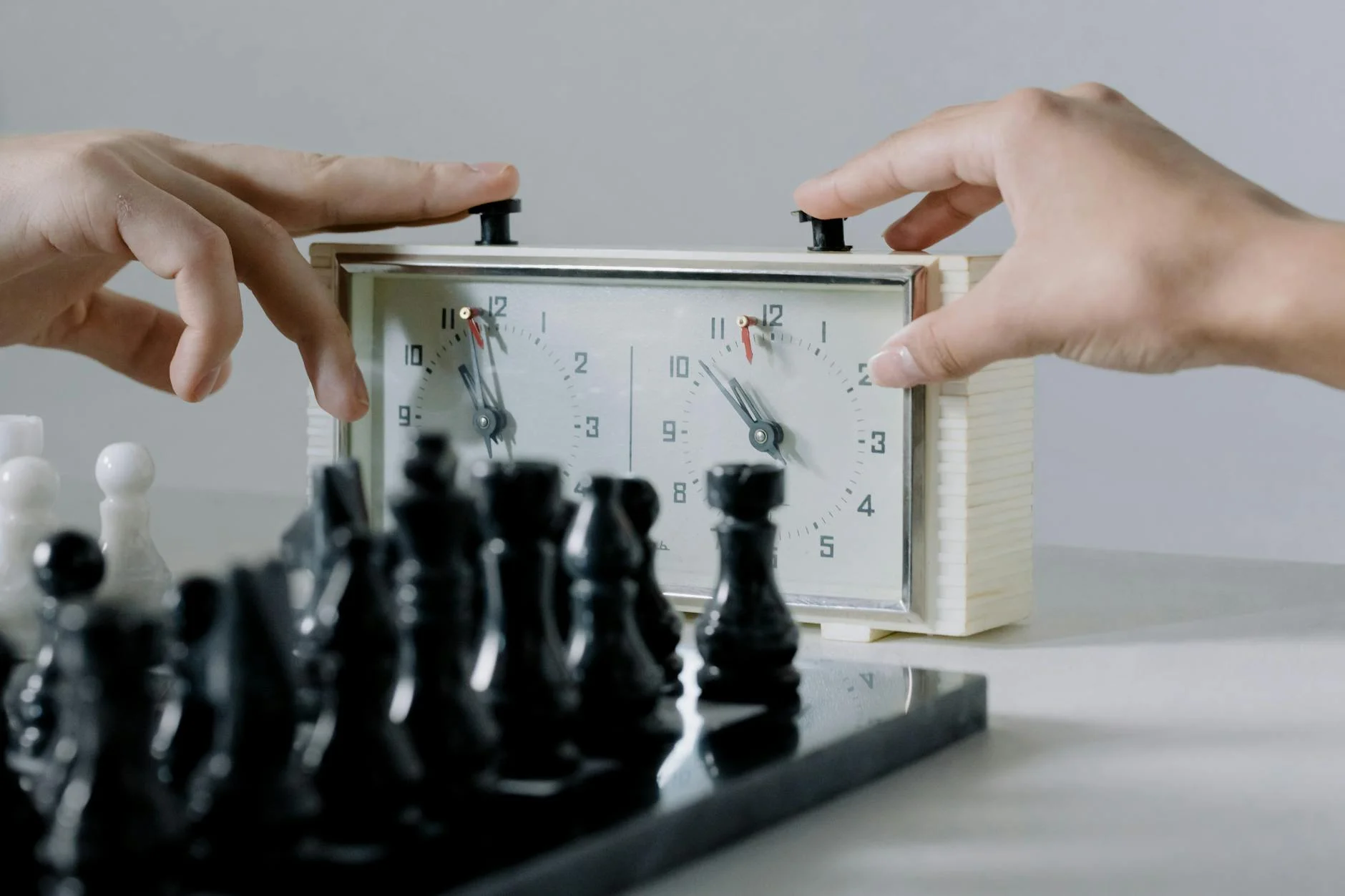 Close Up Of Hands Pressing Chess Clock D 1