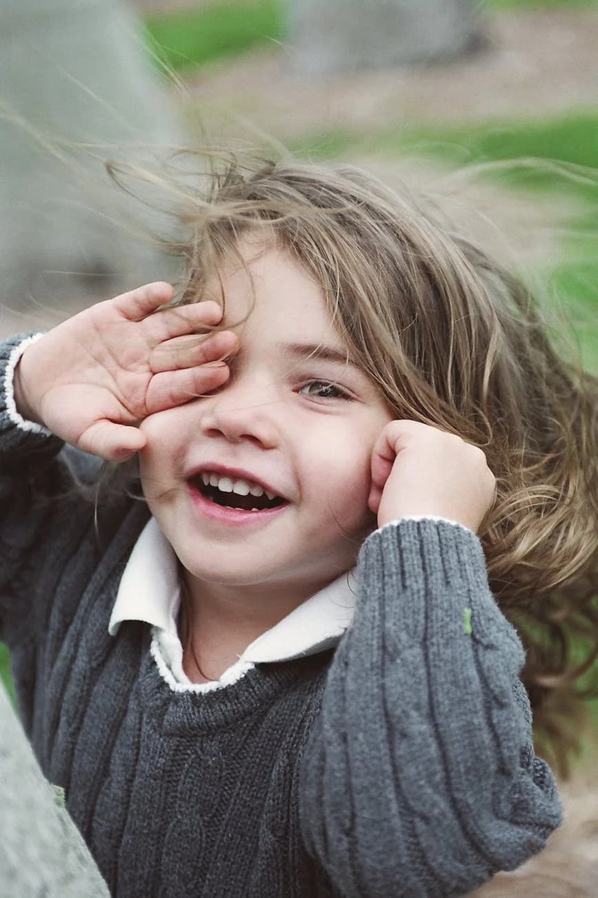 Happy Child Laughing And Playing Outside 4