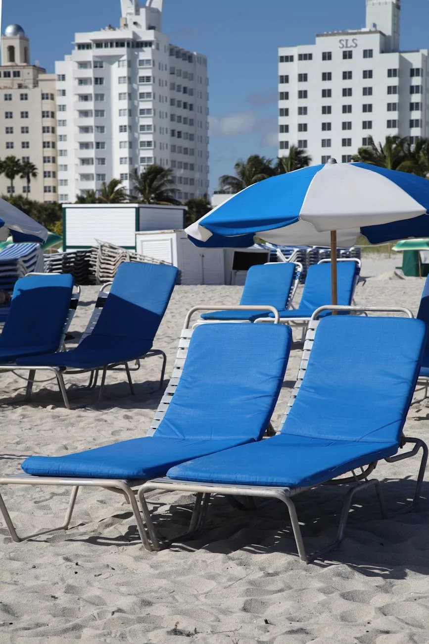Relax On Blue Beach Chairs With Umbrella 3