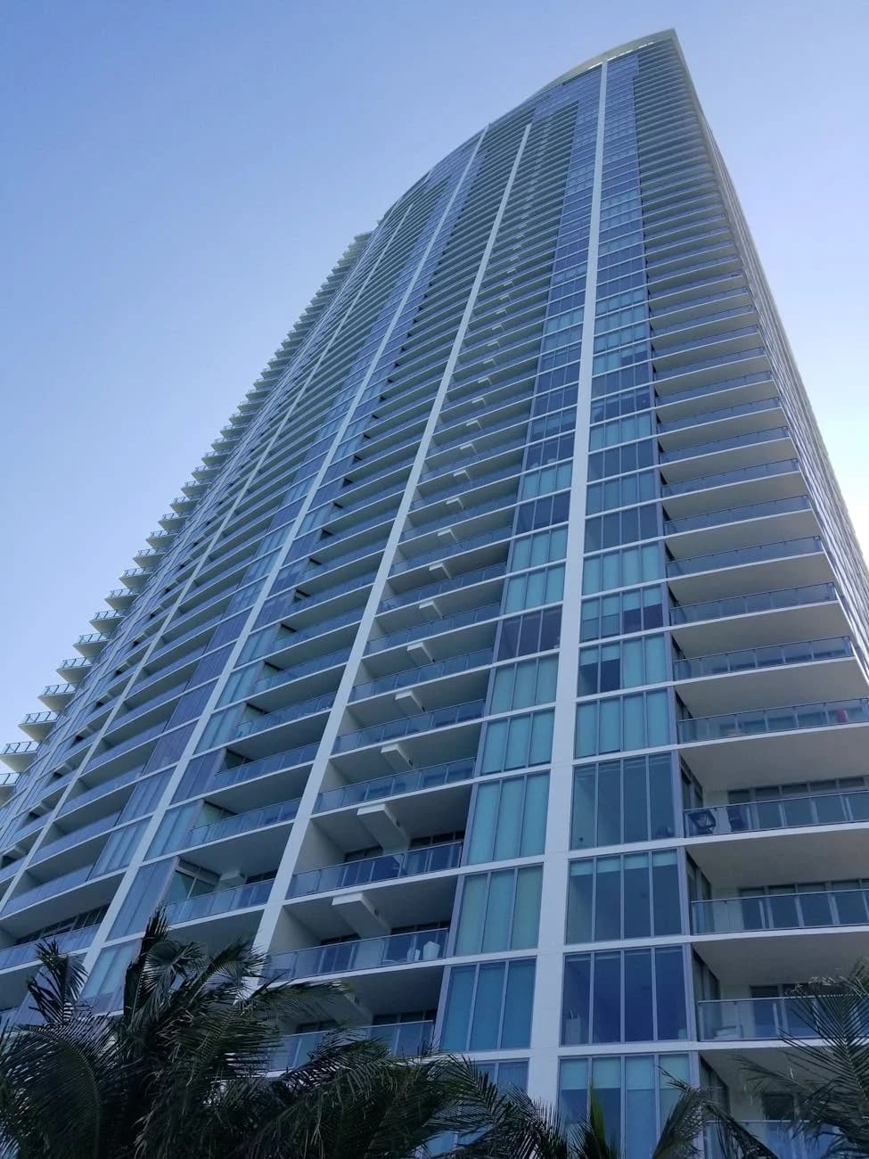 A Sleek Skyscraper In Miami Florida With 1