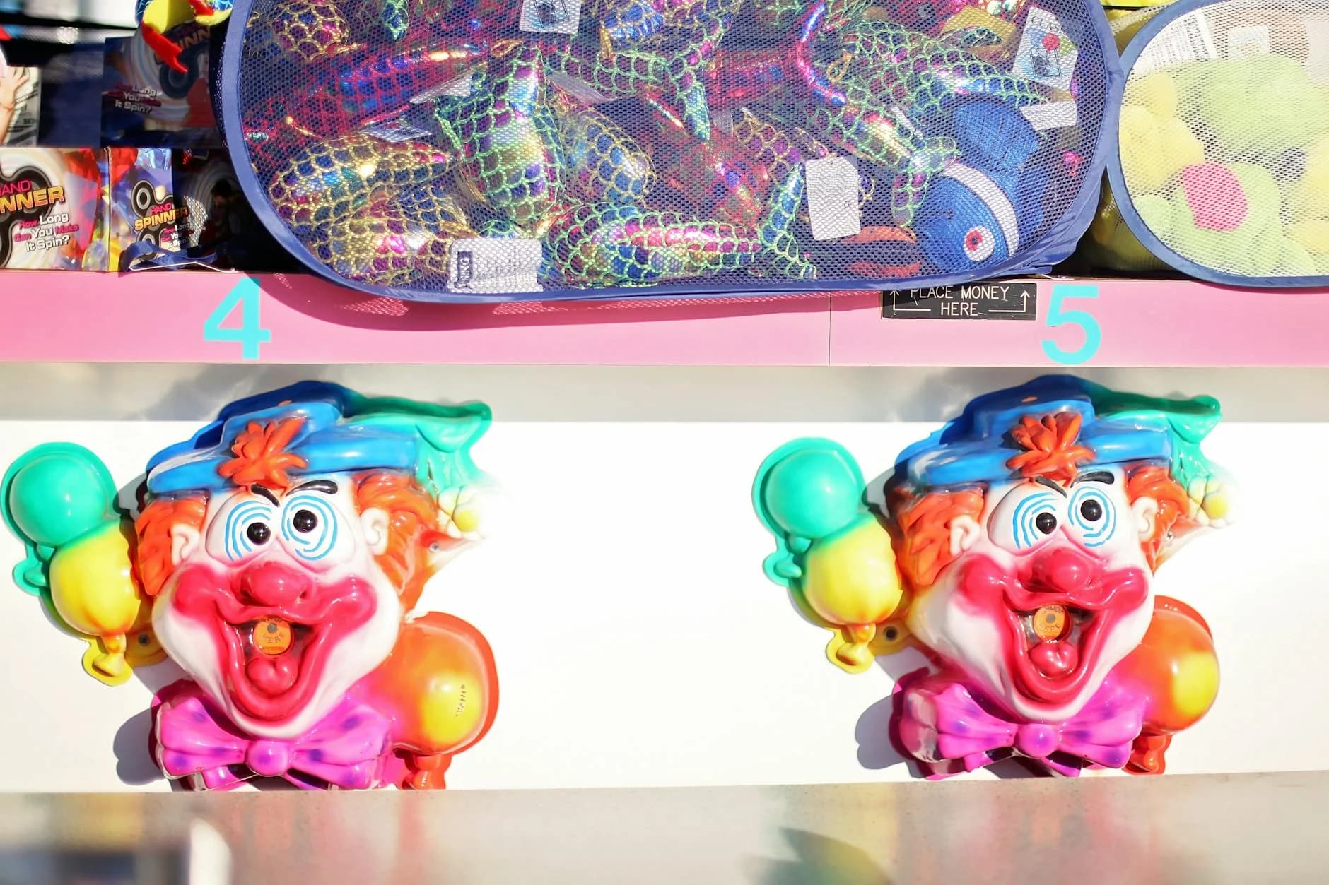 Brightly Colored Clown Game Machines At 1