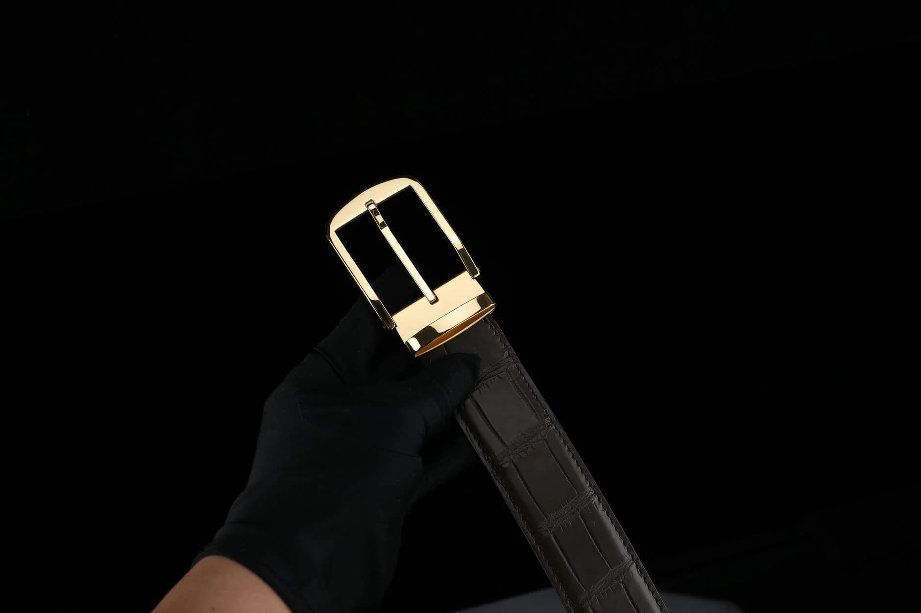 A Close Up Of A Hand In Glove Holding A 1