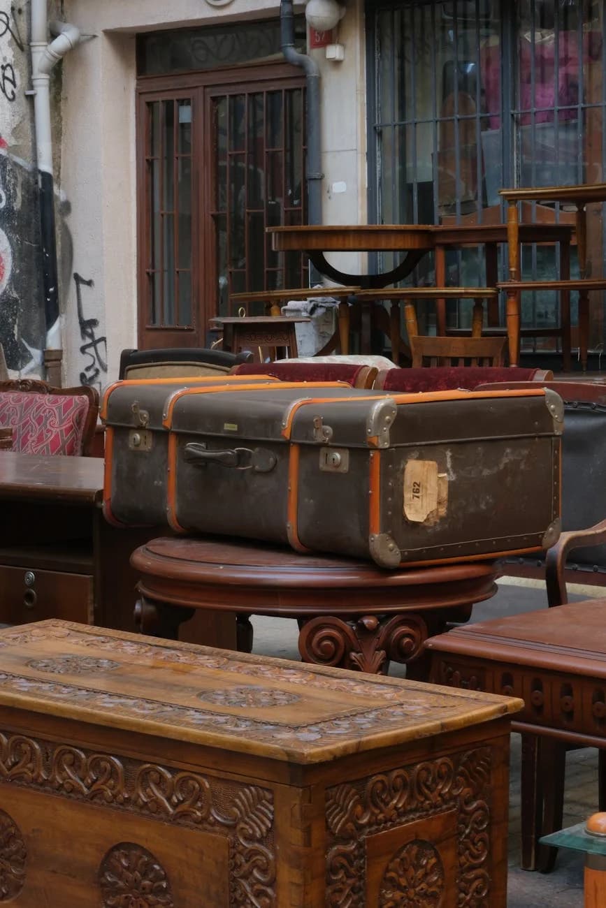 A Collection Of Vintage Suitcases And An 1
