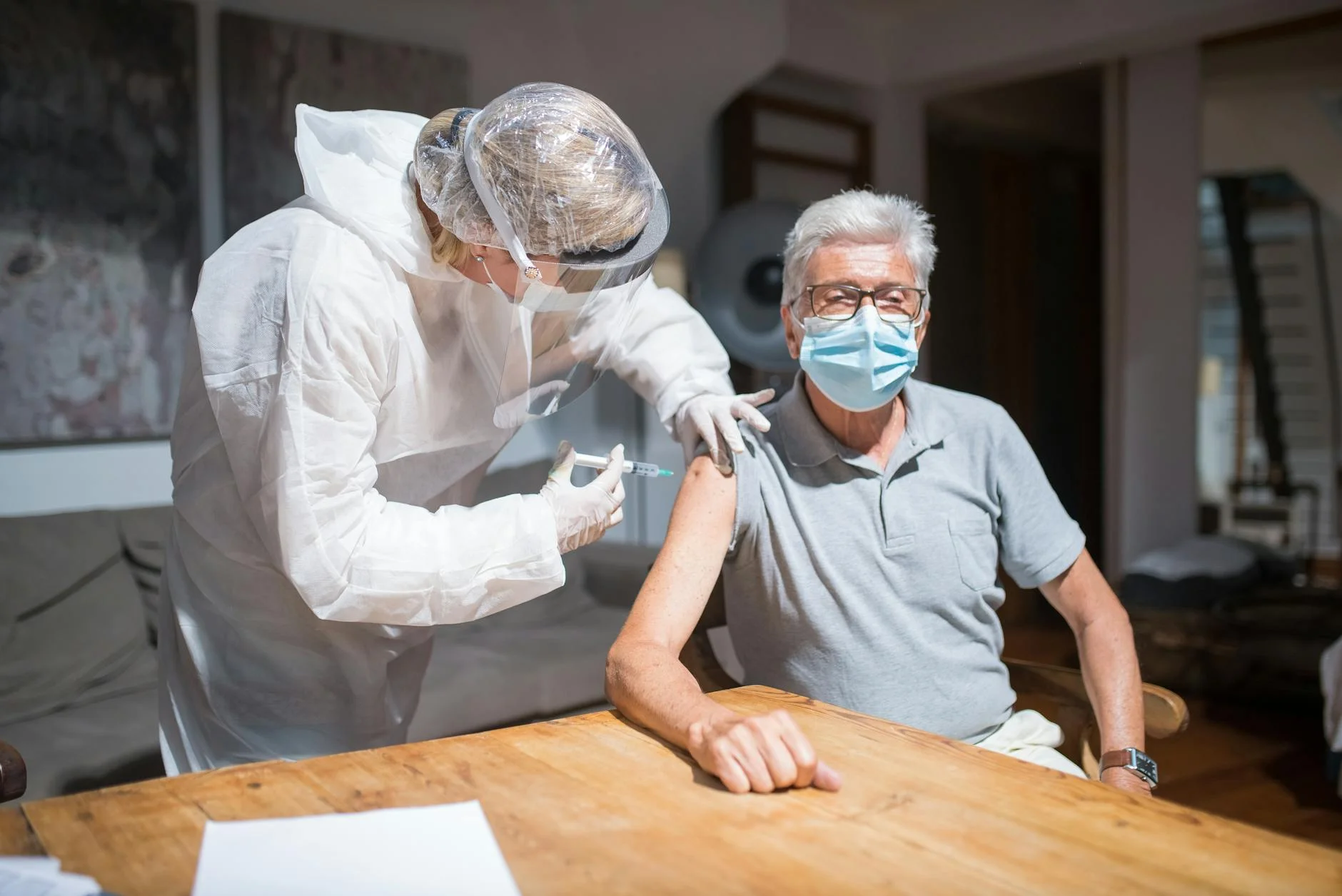 A Healthcare Worker Administers A Covid 1