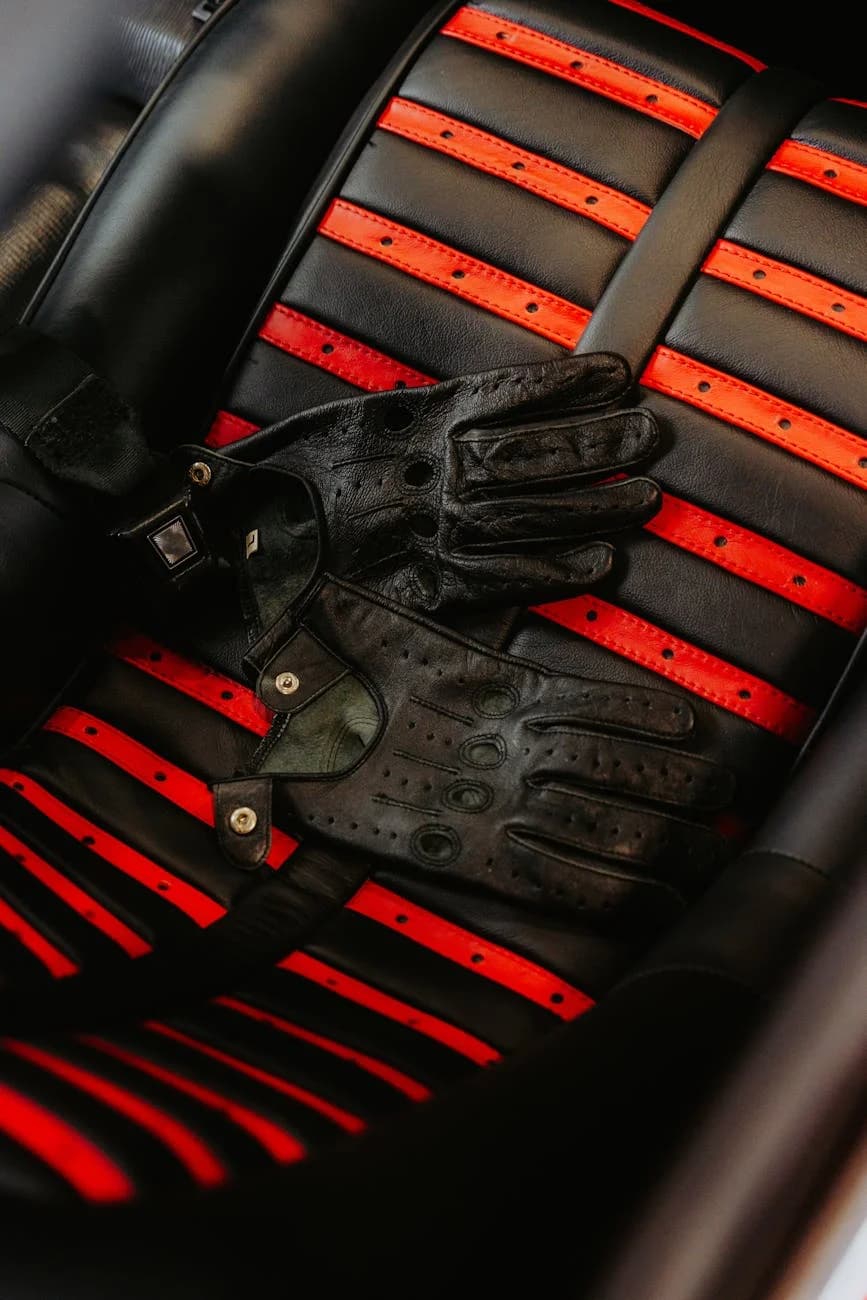 Black Leather Driving Gloves Placed On A 2