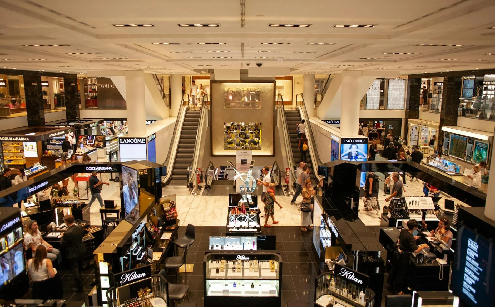 A Bustling Scene Inside A Modern Shoppin 4