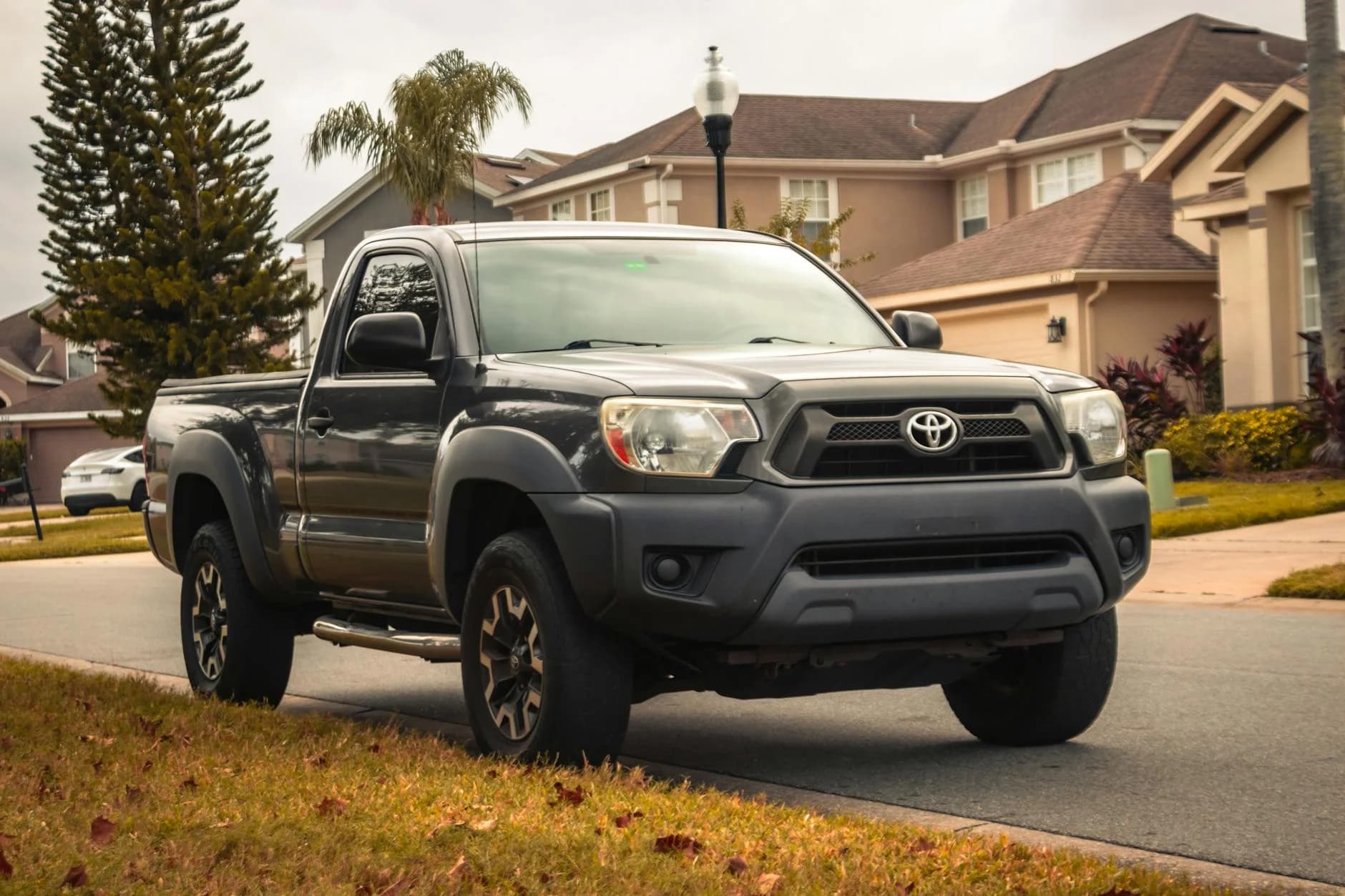 Loc Gray Toyota Tacoma Parked In A Suburban 1