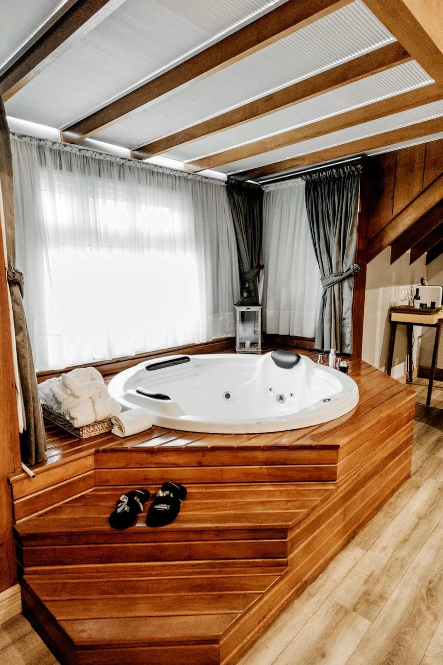 Elegant Indoor Spa Featuring A Modern Wo 4