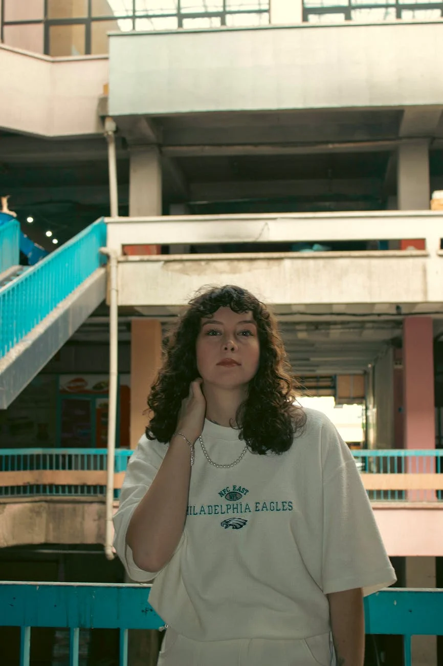 Young Woman With Curly Hair Posing In An 3