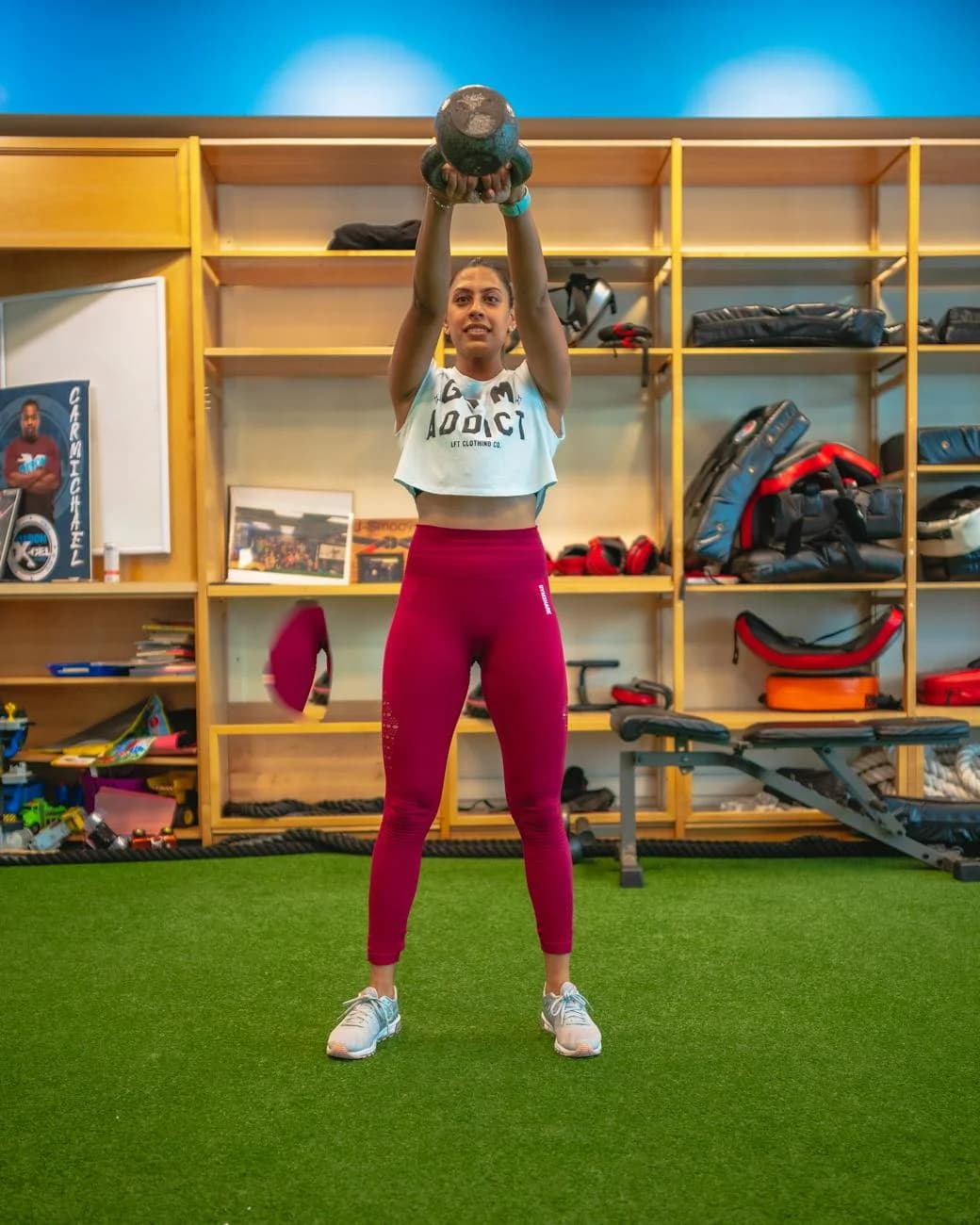 Fitness Enthusiast Lifting A Kettle Bell 2