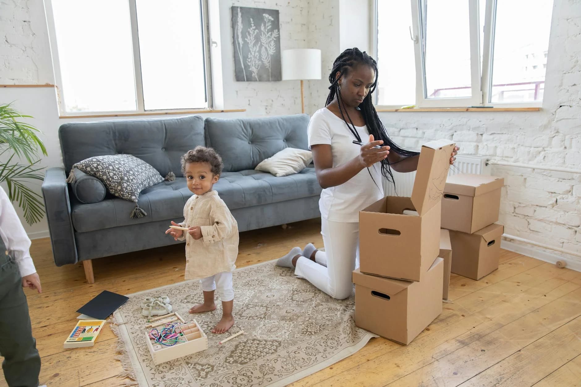 Mother And Child Packing Boxes In A Brig 2