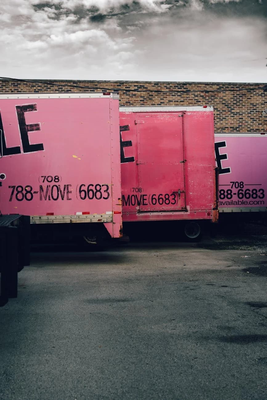 Svc Pink Moving Trucks Parked In A Chicago A 3