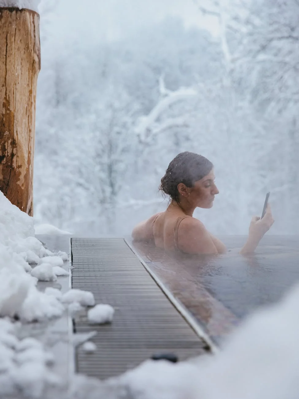 A Woman Relaxes In A Steamy Outdoor Jacu 1