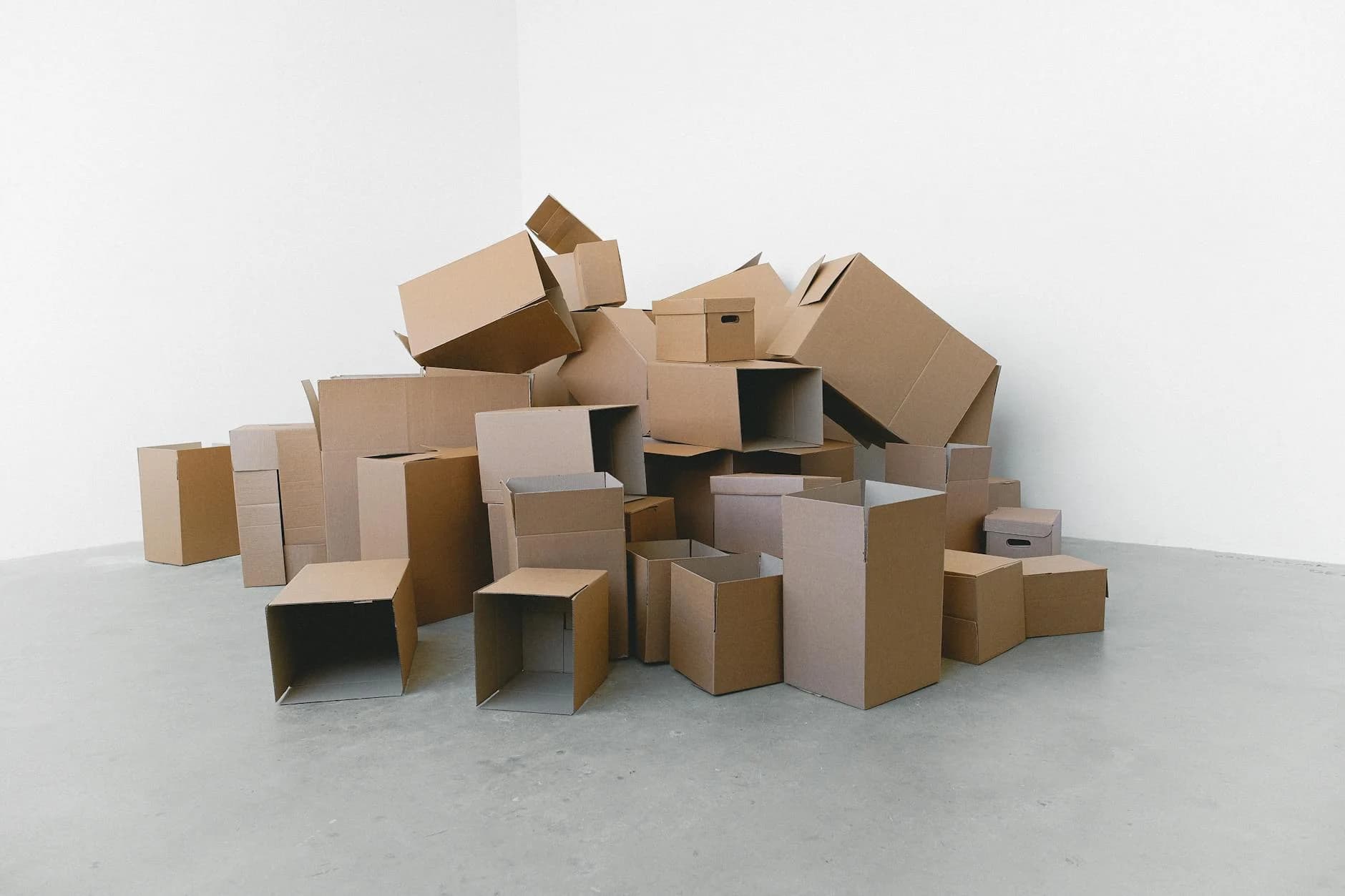 A Pile Of Empty Cardboard Boxes Arranged 2