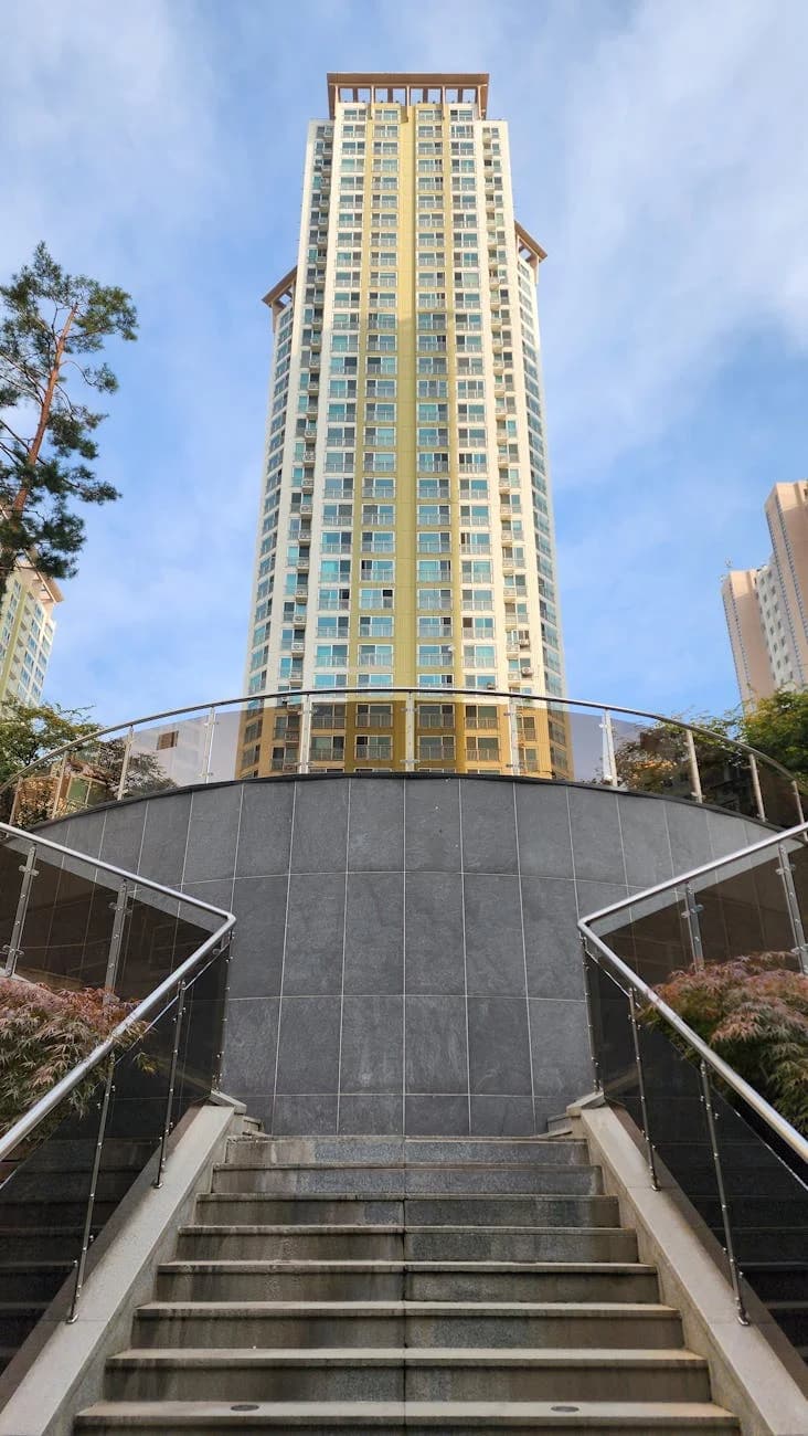 Upward View Of A Tall Modern Building Wi 1