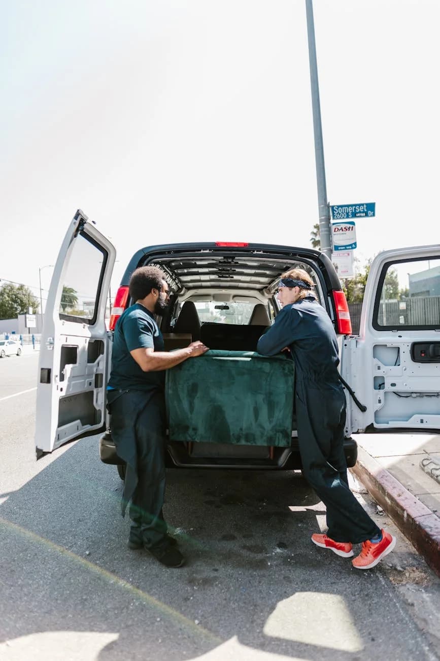 Svc Two Movers Load A Van With Furniture Dur 1