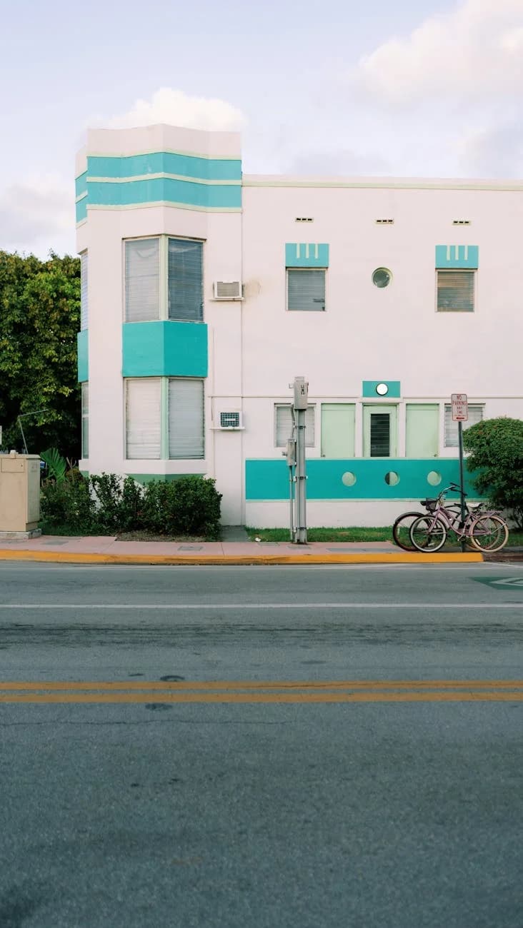 Art Deco Building With Teal Accents And 3