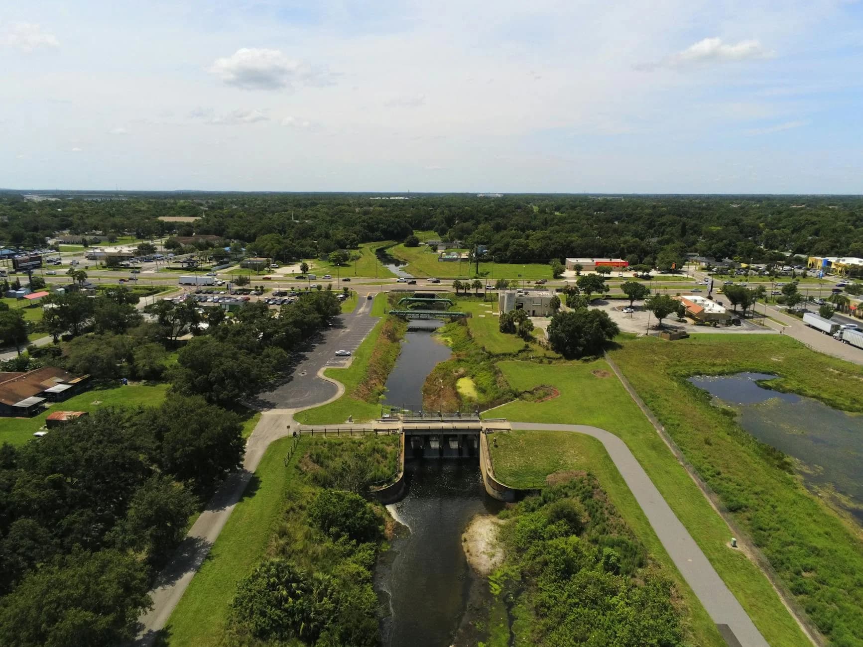 A Scenic Aerial View Of A River And Gree 3