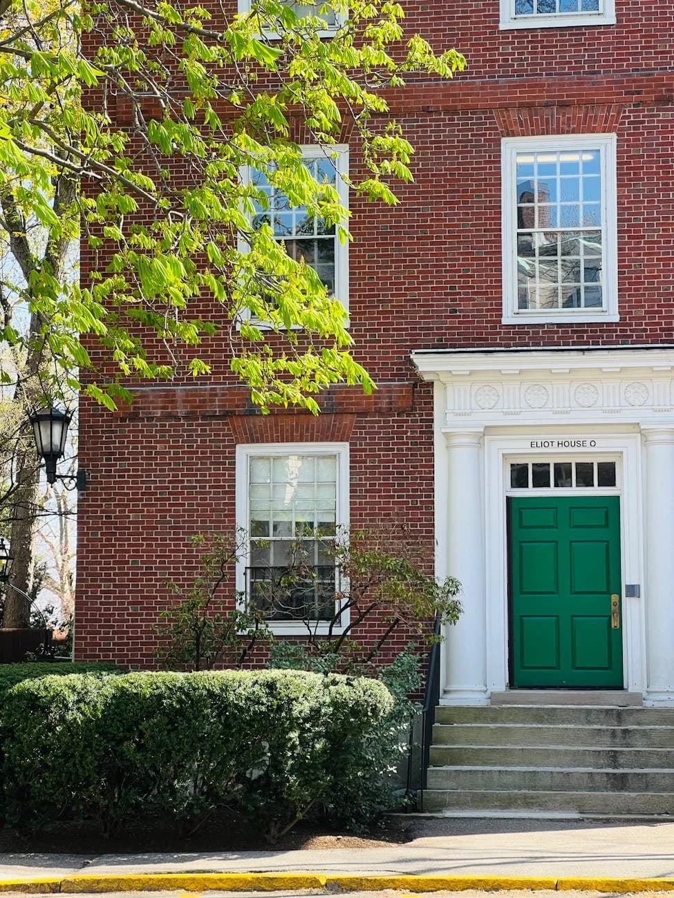 Charming Brick Facade With Green Door At 1
