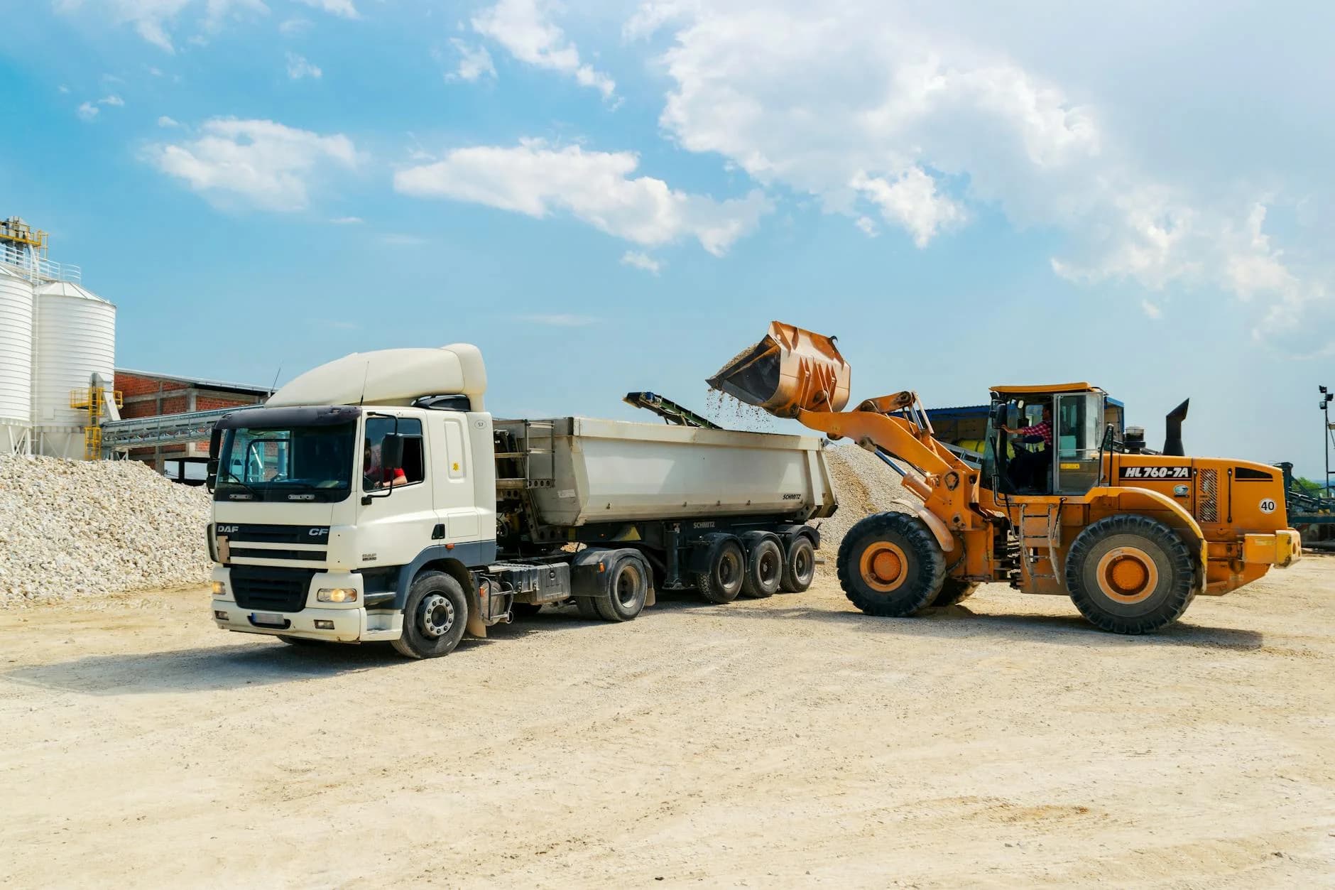 Svc Excavator Loading Materials Into A Heavy 1