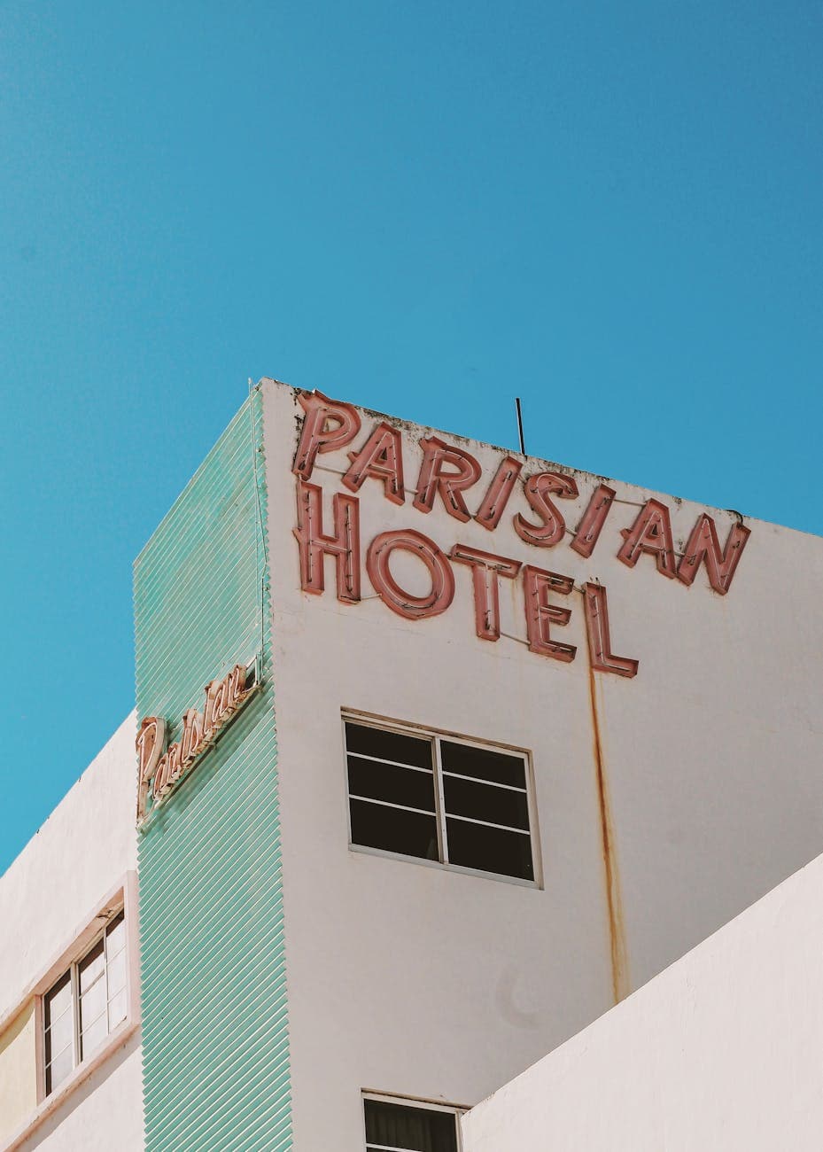 An Exterior View Of Parisian Hotel With 1