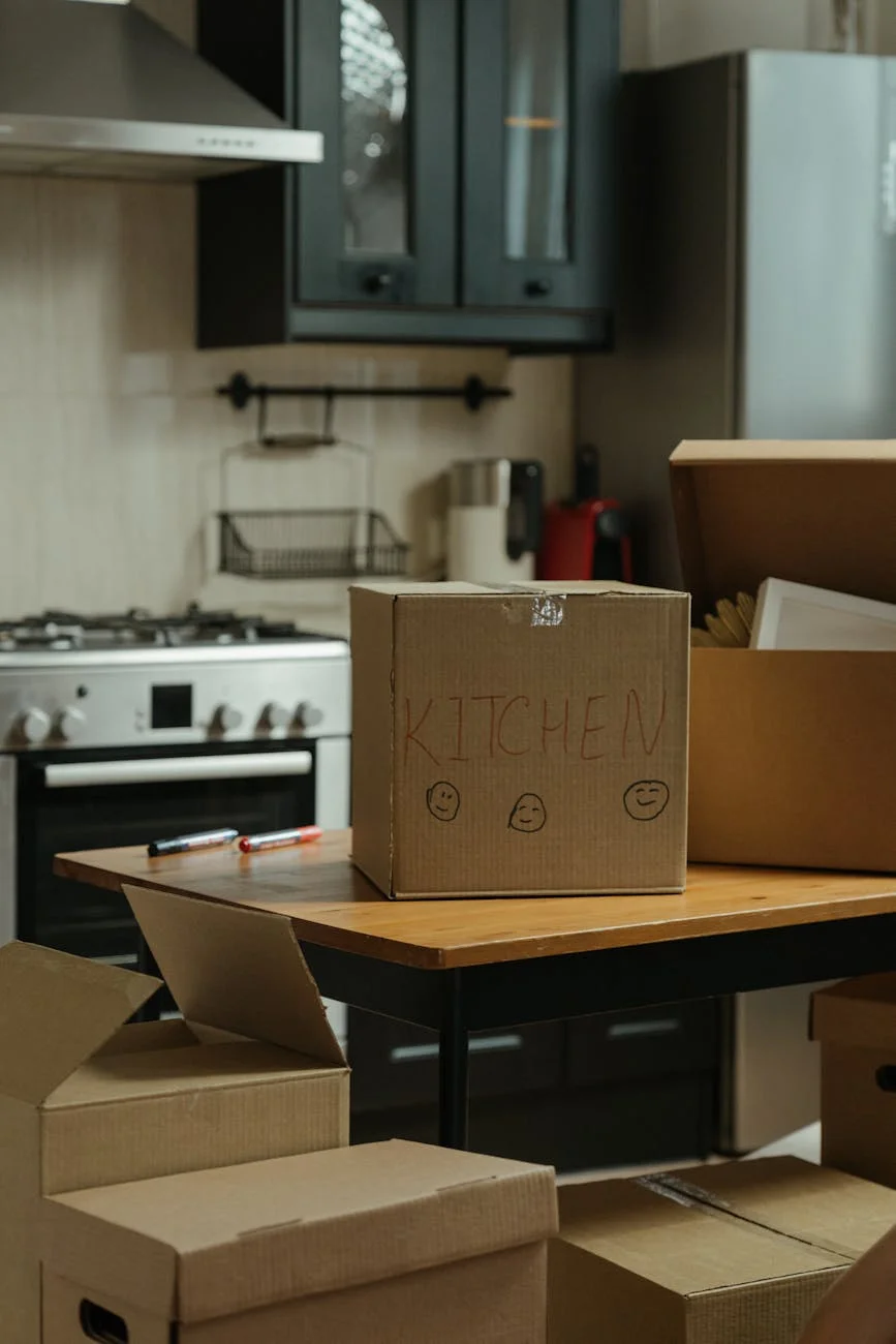 Svc Cardboard Moving Boxes In A Modern Kitch 1