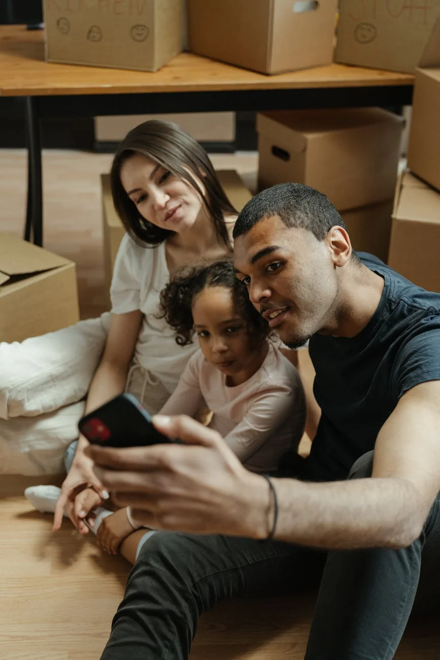 Family Enjoying Selfie Time While Surrou 2