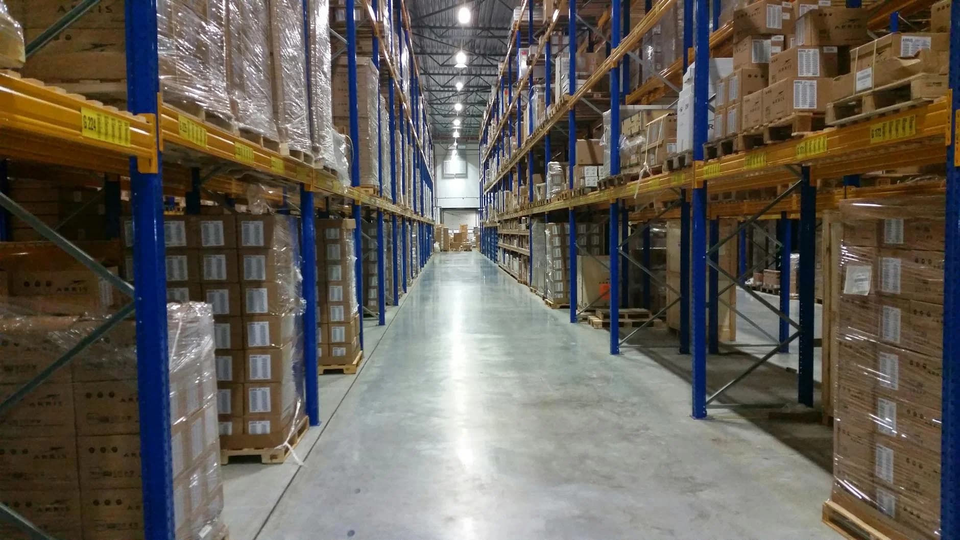 Interior View Of A Large Warehouse Aisle 4